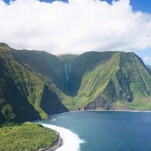 Witnessing the beauty of Maui mountains with ocean during the air adventure with Air Maui.