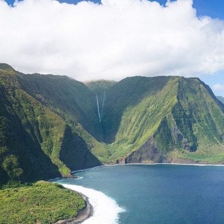 Witnessing the beauty of Maui mountains with ocean during the air adventure with Air Maui.