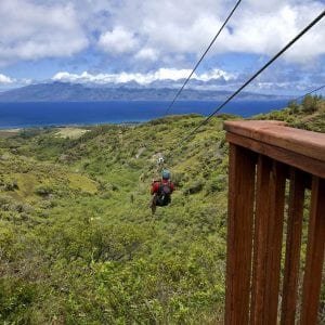 Thrilling zipline ride over scenic valley on Kapalua tour in Maui.