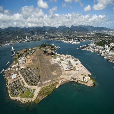 Aerial vista of Ford Island and Pearl Harbor seen during helicopter tour.